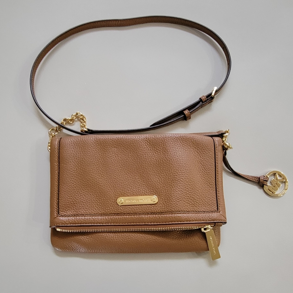 Michael kors crossbody with gold hardware and adjustable strap